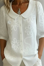 LOREA | Blusa elegante de flores
